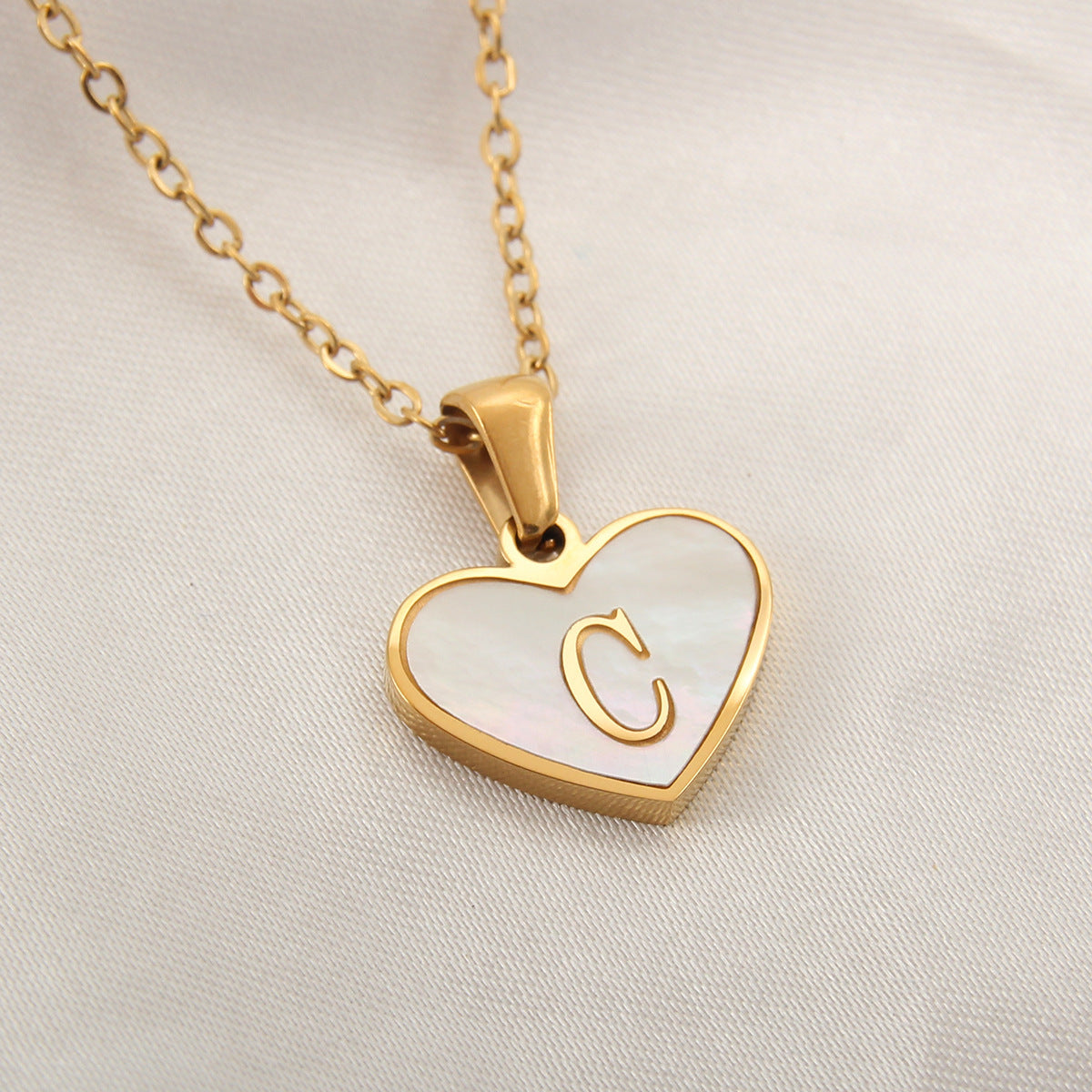 Heartfelt Elegance: 26-Letter White Shell Heart Necklace