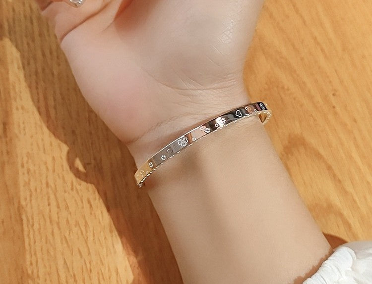 Radiant Grace: Sterling Silver Hand Ornament Opening Bracelet for Women