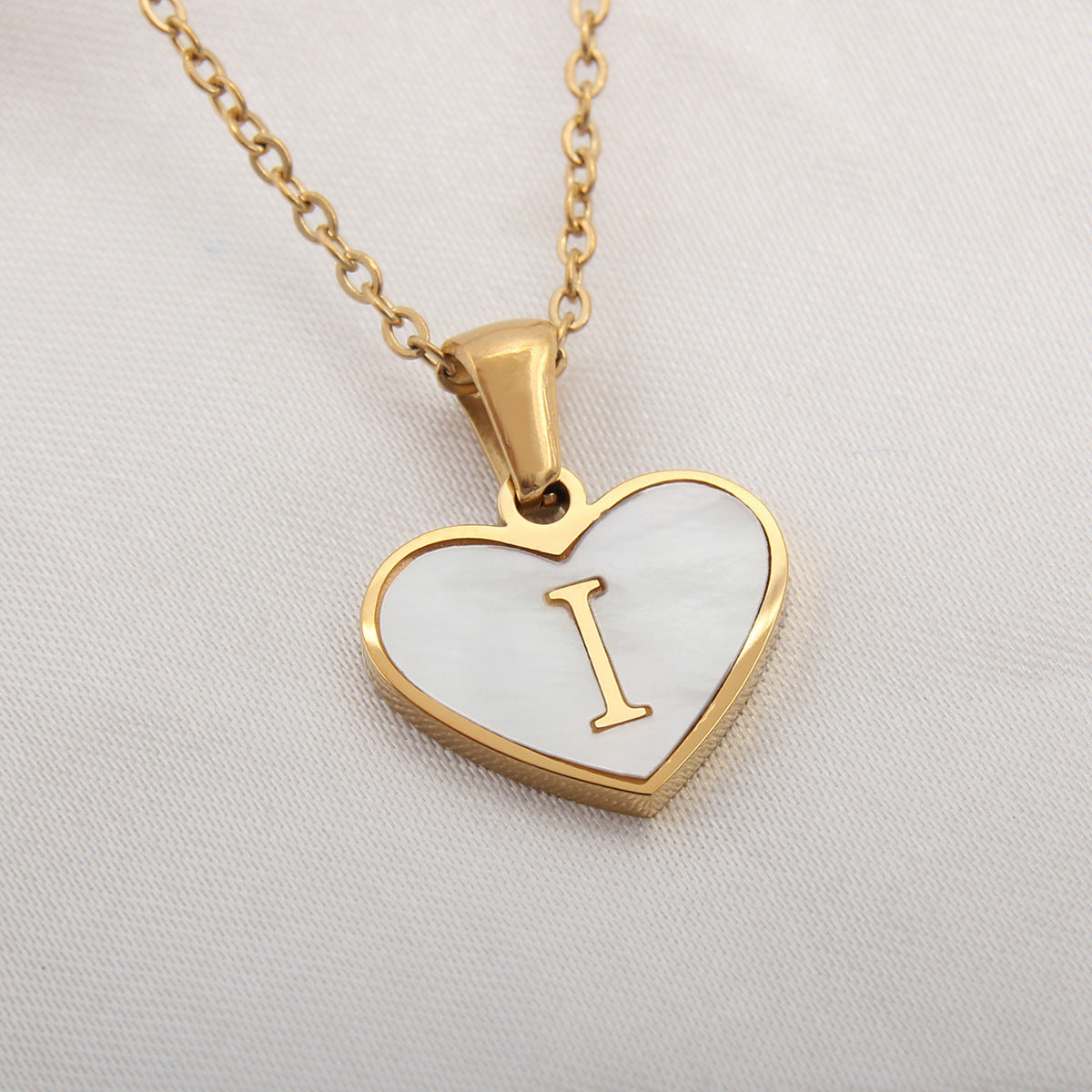 Heartfelt Elegance: 26-Letter White Shell Heart Necklace