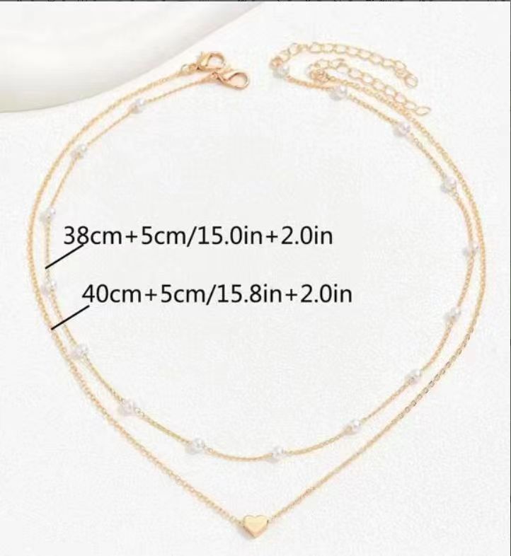 Pearl Harmony: Double Layer Twin Heart Necklace with Special-interest Design