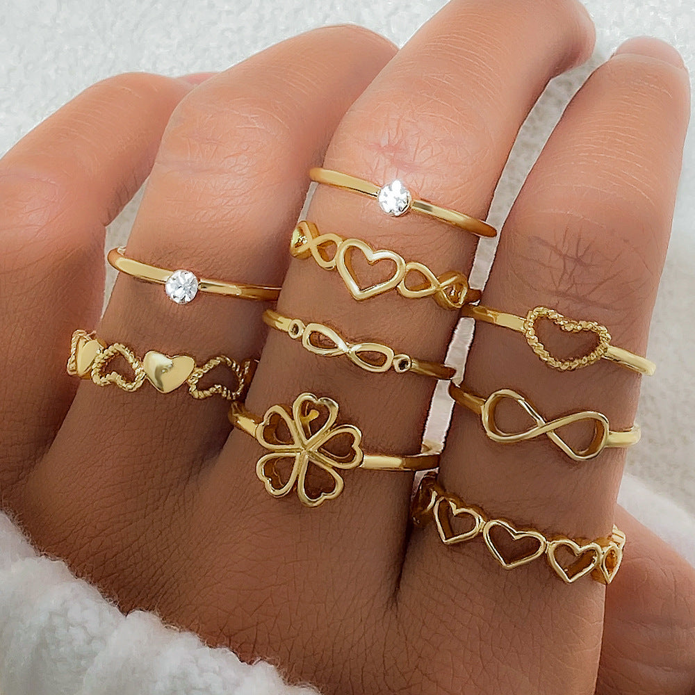 Vintage Gold Heart Rings Set: 9-Piece Collection Featuring Hollow Irregular Geometric and Butterfly Designs, Perfect Fashion Jewelry Accessories Gift for Women