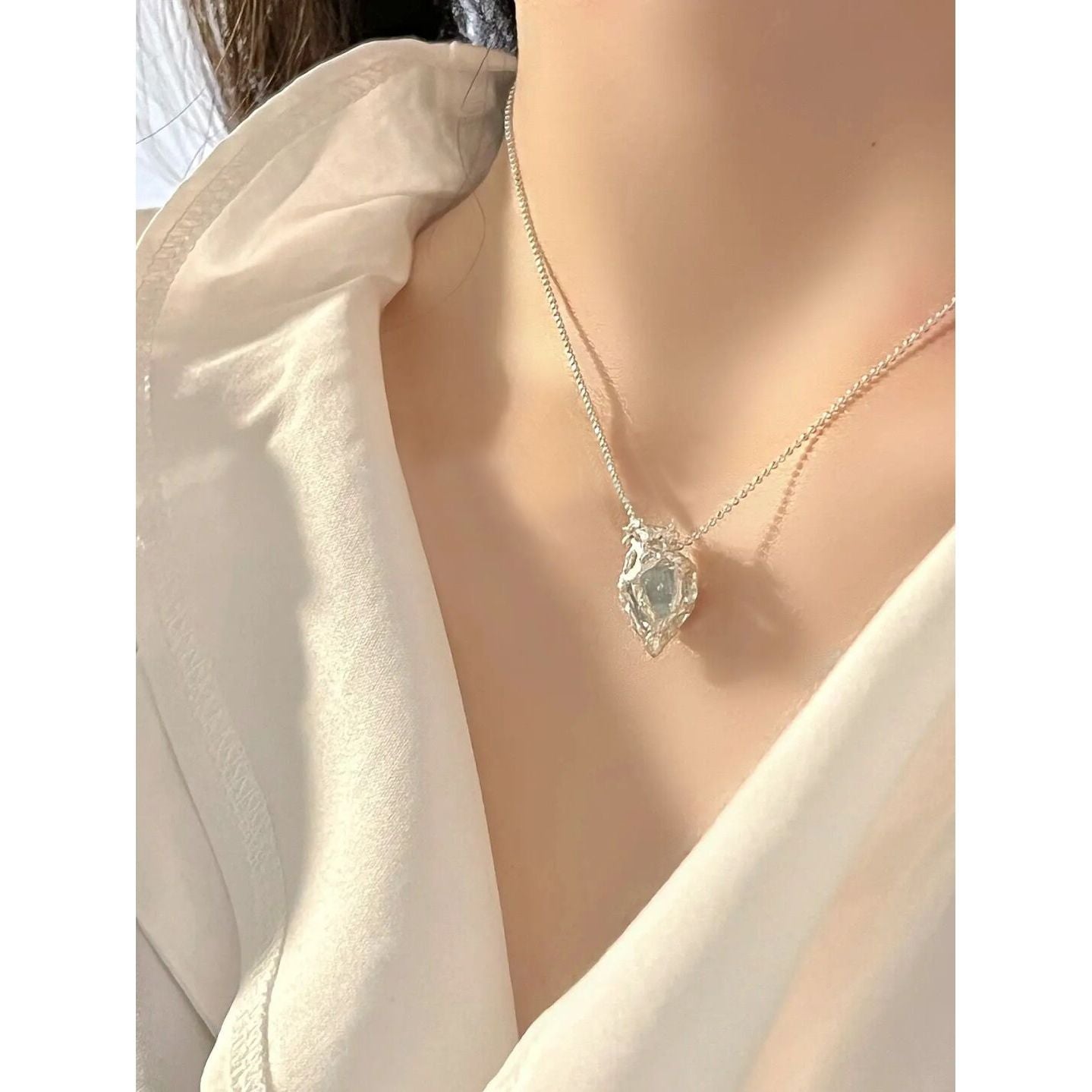 Glacial Grace: Blue Ice Heart Necklace