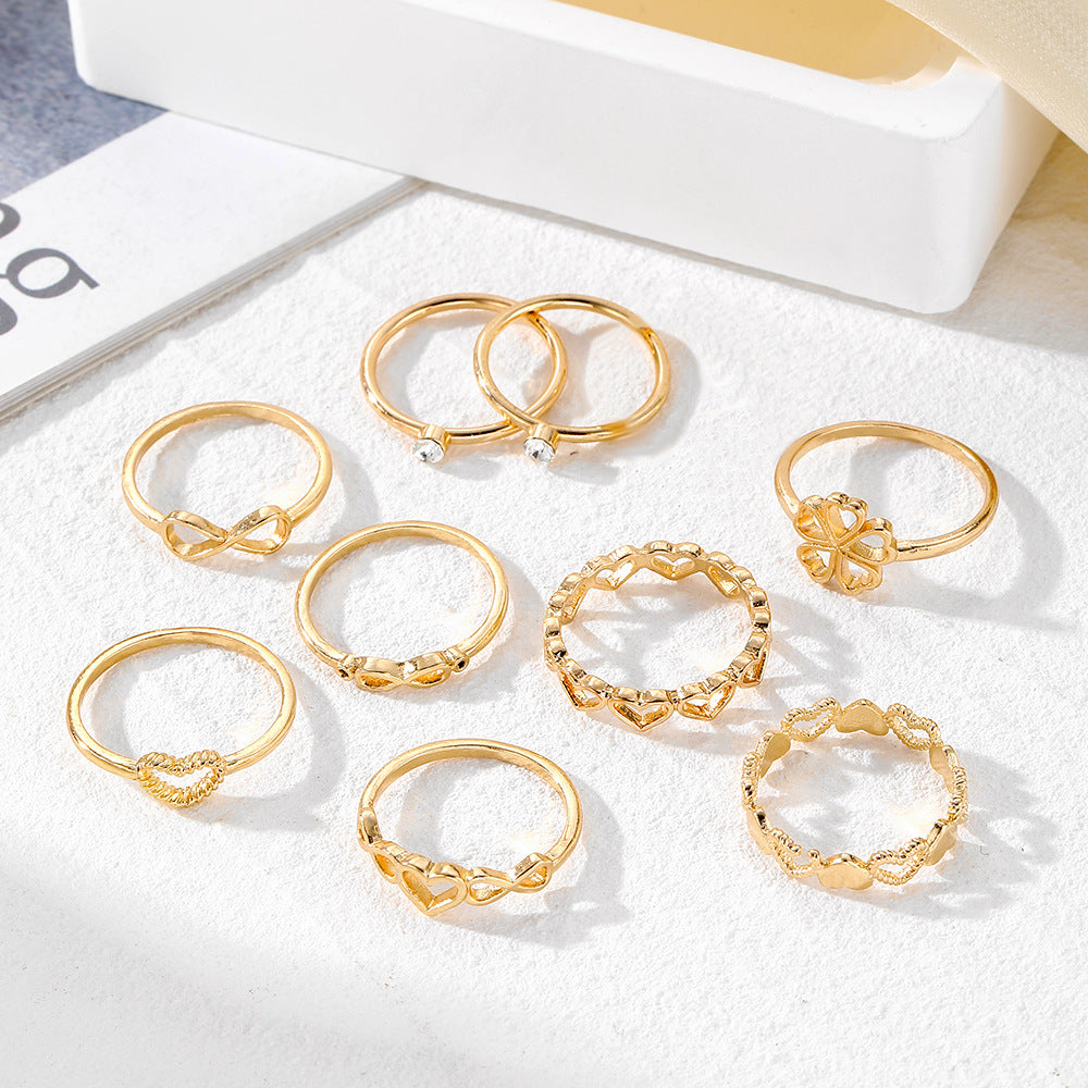 Vintage Gold Heart Rings Set: 9-Piece Collection Featuring Hollow Irregular Geometric and Butterfly Designs, Perfect Fashion Jewelry Accessories Gift for Women