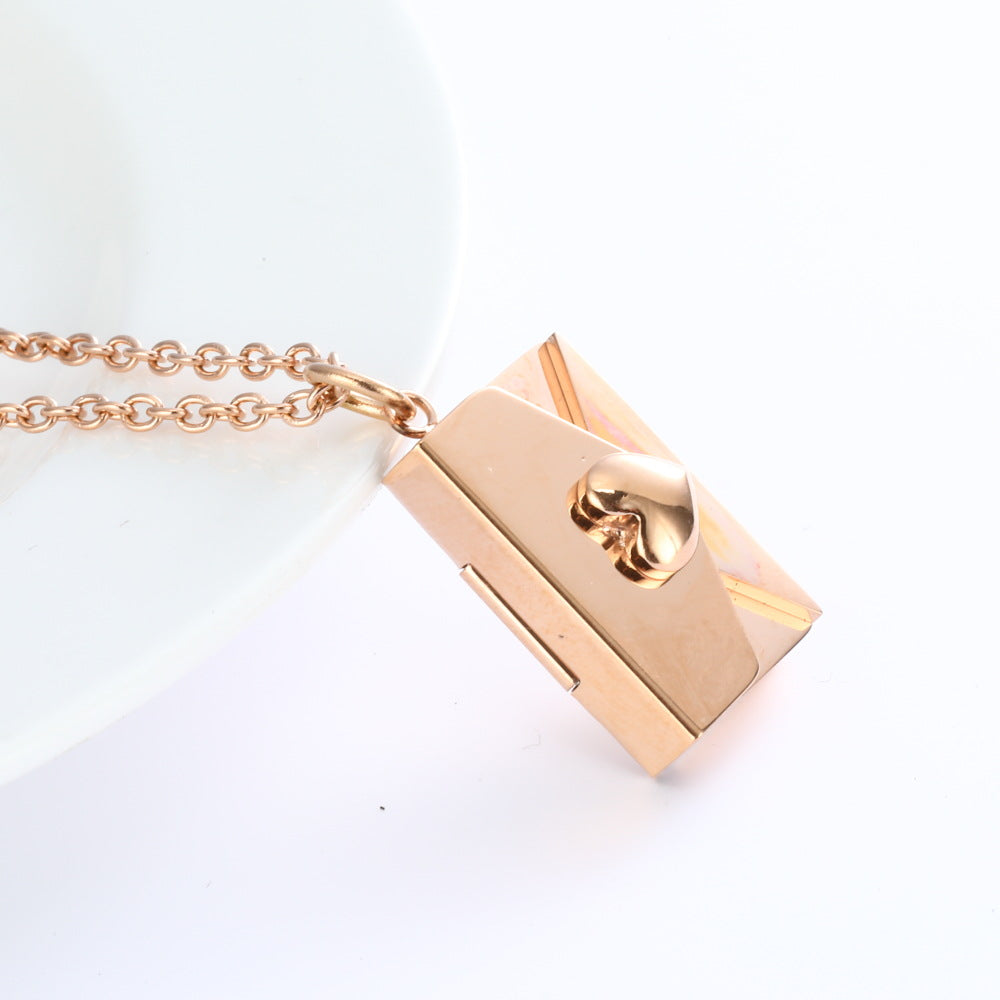 Secret Sentiments: Peach Heart Envelope Necklace - A Thoughtful Jewelry Gift for Couples