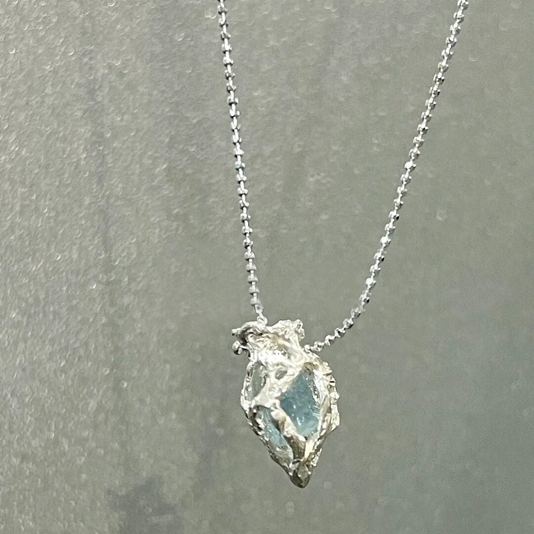 Glacial Grace: Blue Ice Heart Necklace