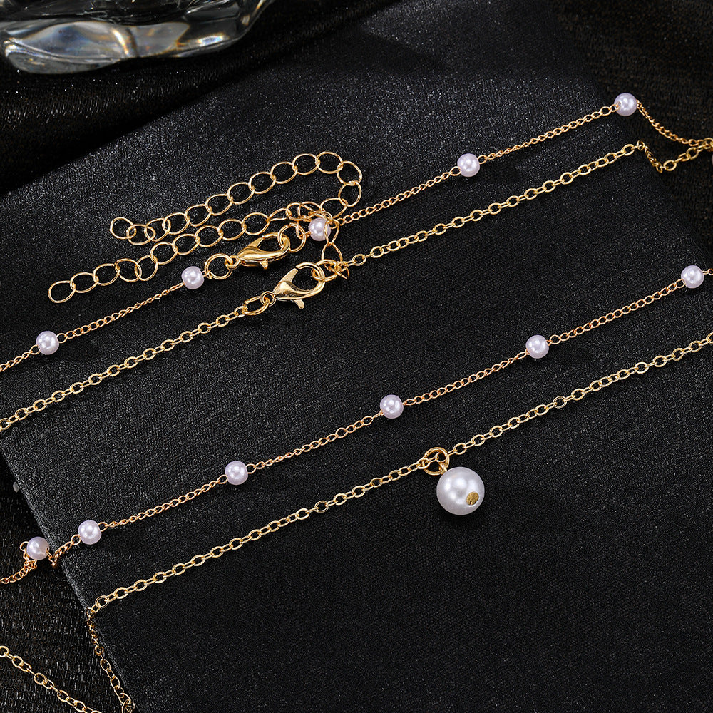 Pearl Cascade: Double-Layered Tassel Pendant Necklace