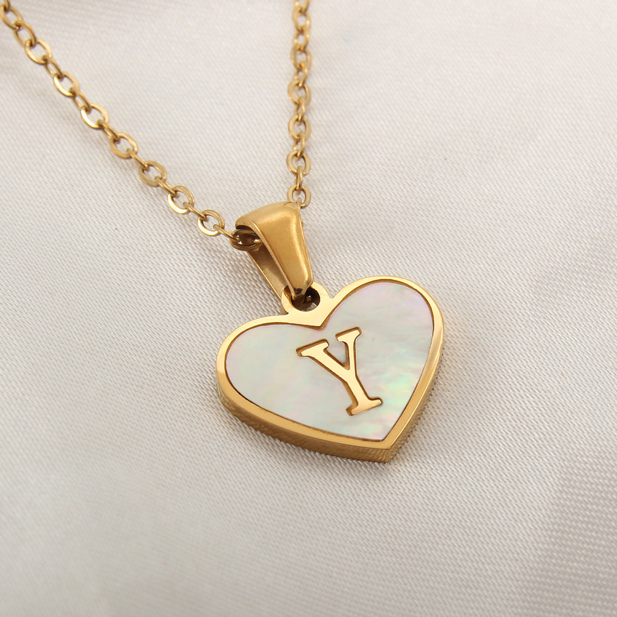 Heartfelt Elegance: 26-Letter White Shell Heart Necklace