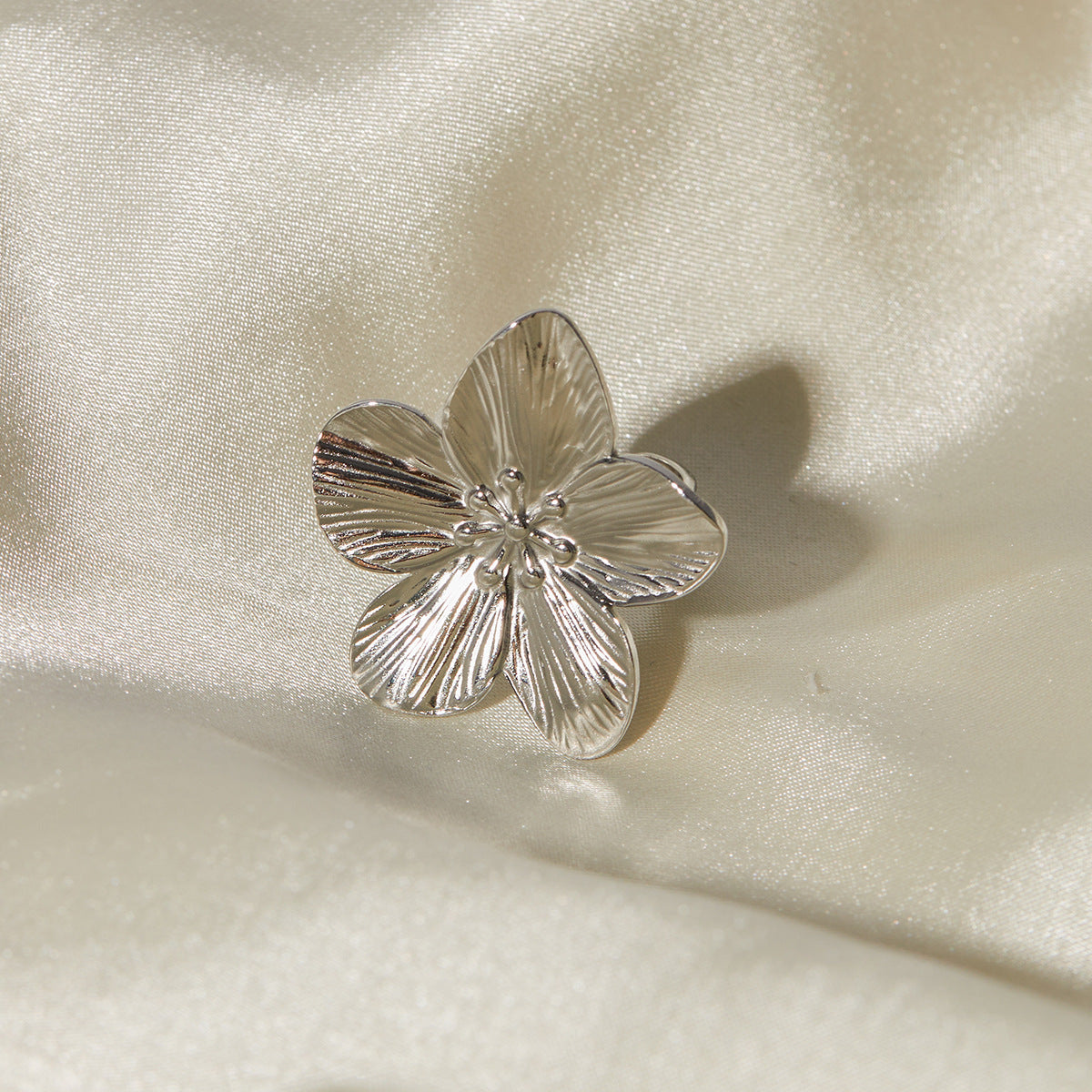 Silver Flower Petal Ring: Blossoming Beauty