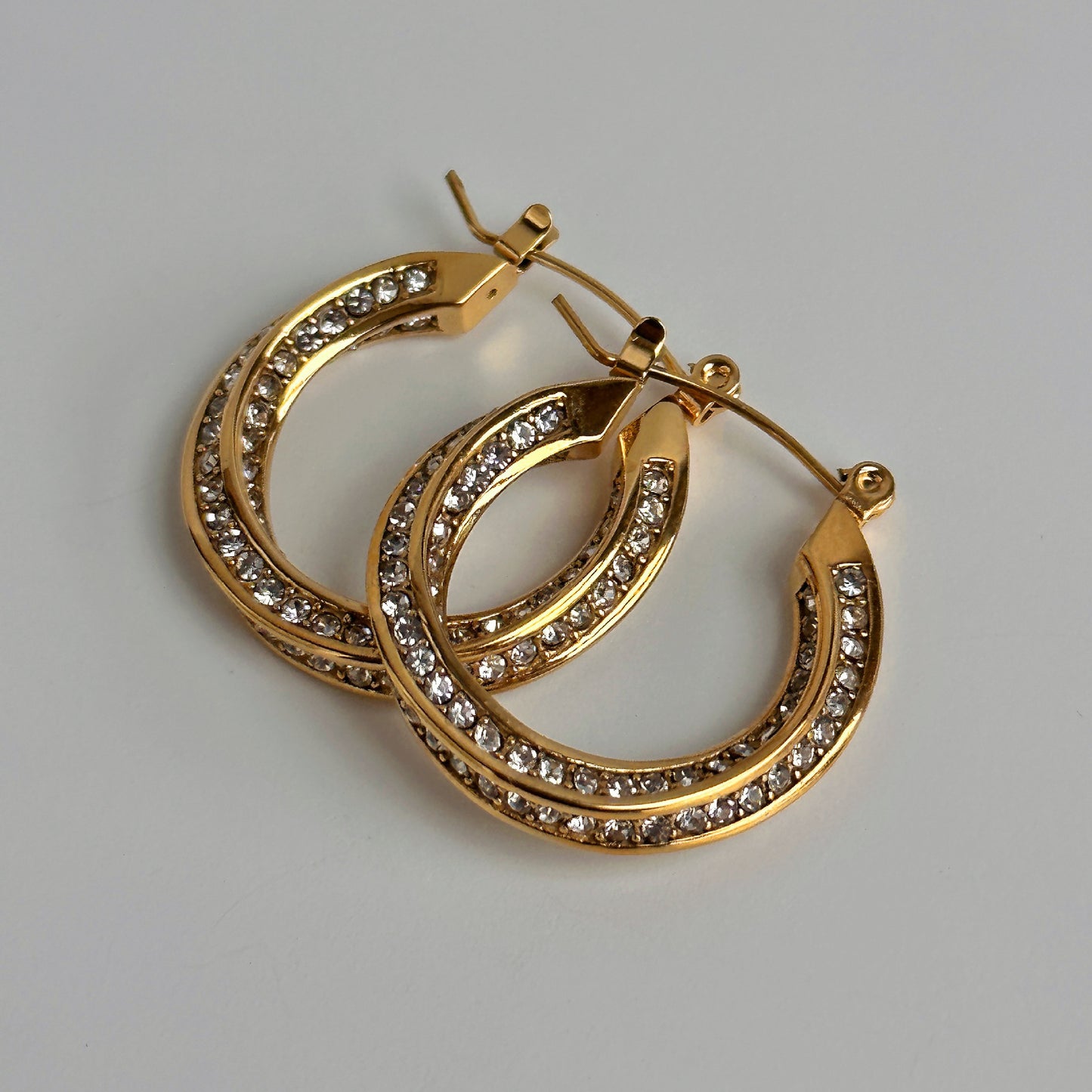 Chic Statement: Titanium Steel Zircon Twist Hoop Earrings