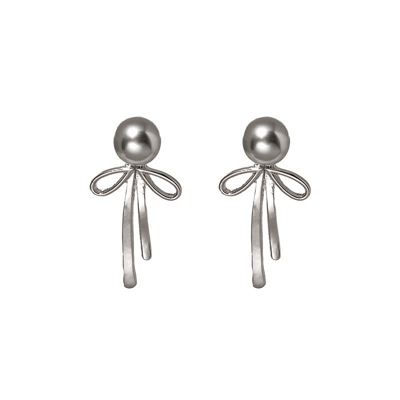 Elegant Niche Bow Earrings for Women: Silver Needle with Pearl Accent