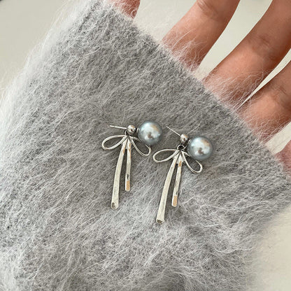 Elegant Niche Bow Earrings for Women: Silver Needle with Pearl Accent