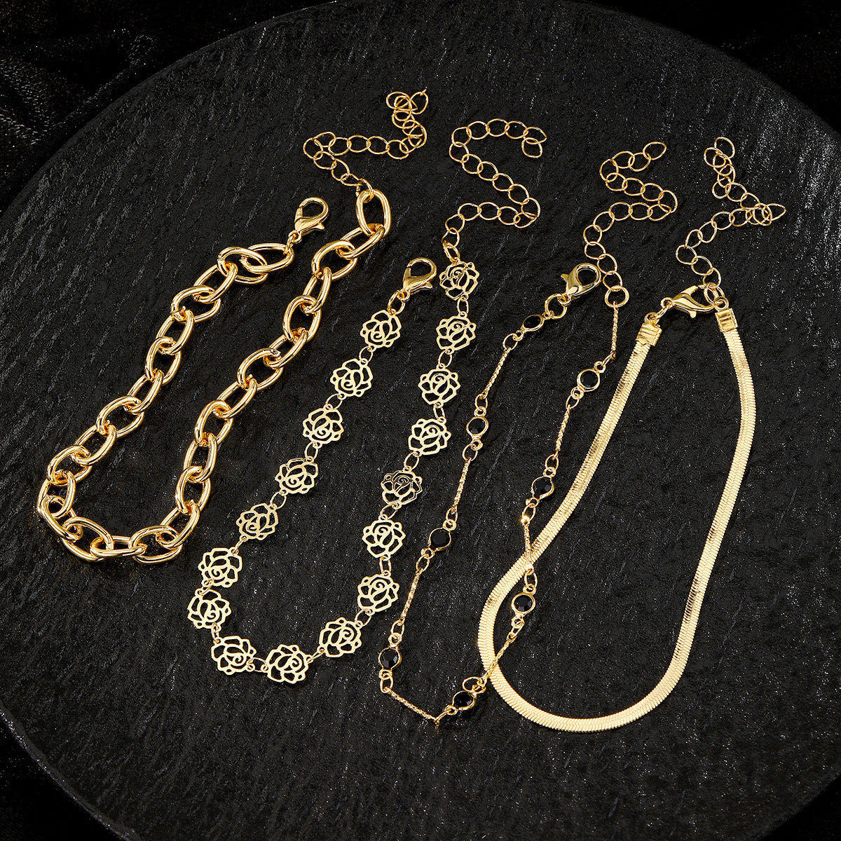 Enchanting Elegance: 4-Piece Set - Snake Chain Rose Black Diamond Anklets