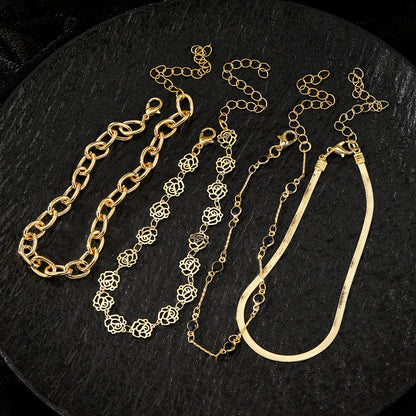 Enchanting Elegance: 4-Piece Set - Snake Chain Rose Black Diamond Anklets