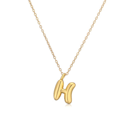 Copper Charisma: A Gilded Alphabet Pendant Necklace