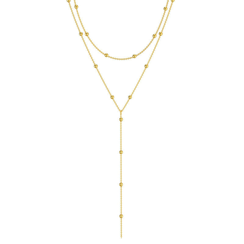 Graceful Geometry: Fashion Long Necklace with Tassel and Round Beads