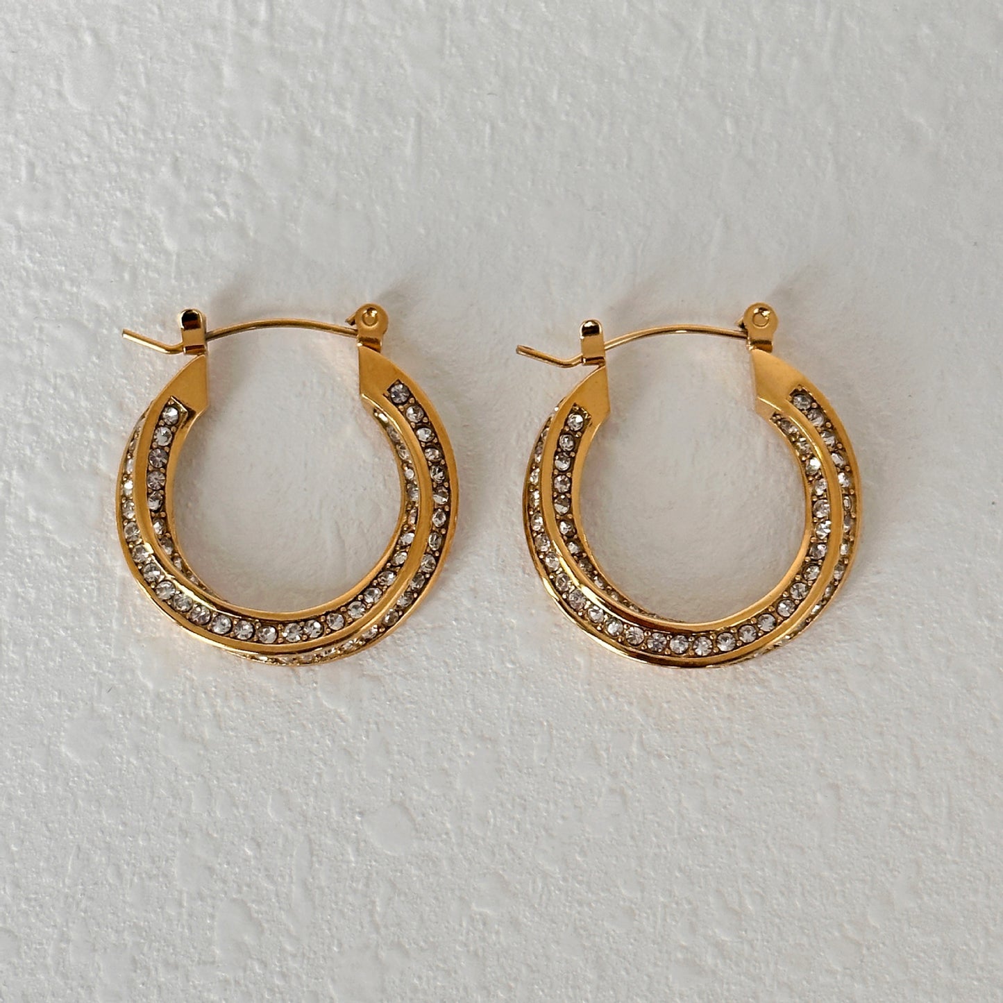 Chic Statement: Titanium Steel Zircon Twist Hoop Earrings